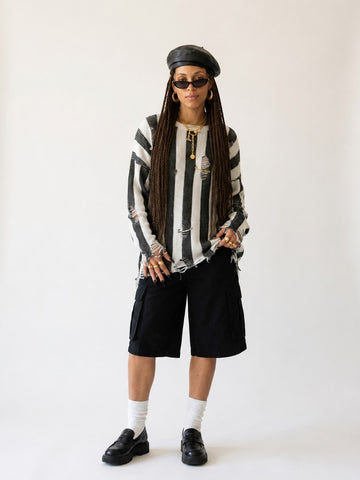Audacious Striped Distressed Knit Sweater