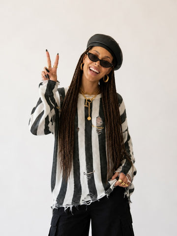 Audacious Striped Distressed Knit Sweater