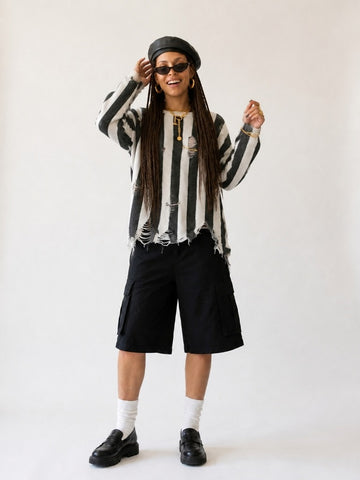 Audacious Striped Distressed Knit Sweater