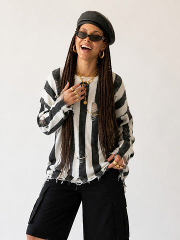 Audacious Striped Distressed Knit Sweater